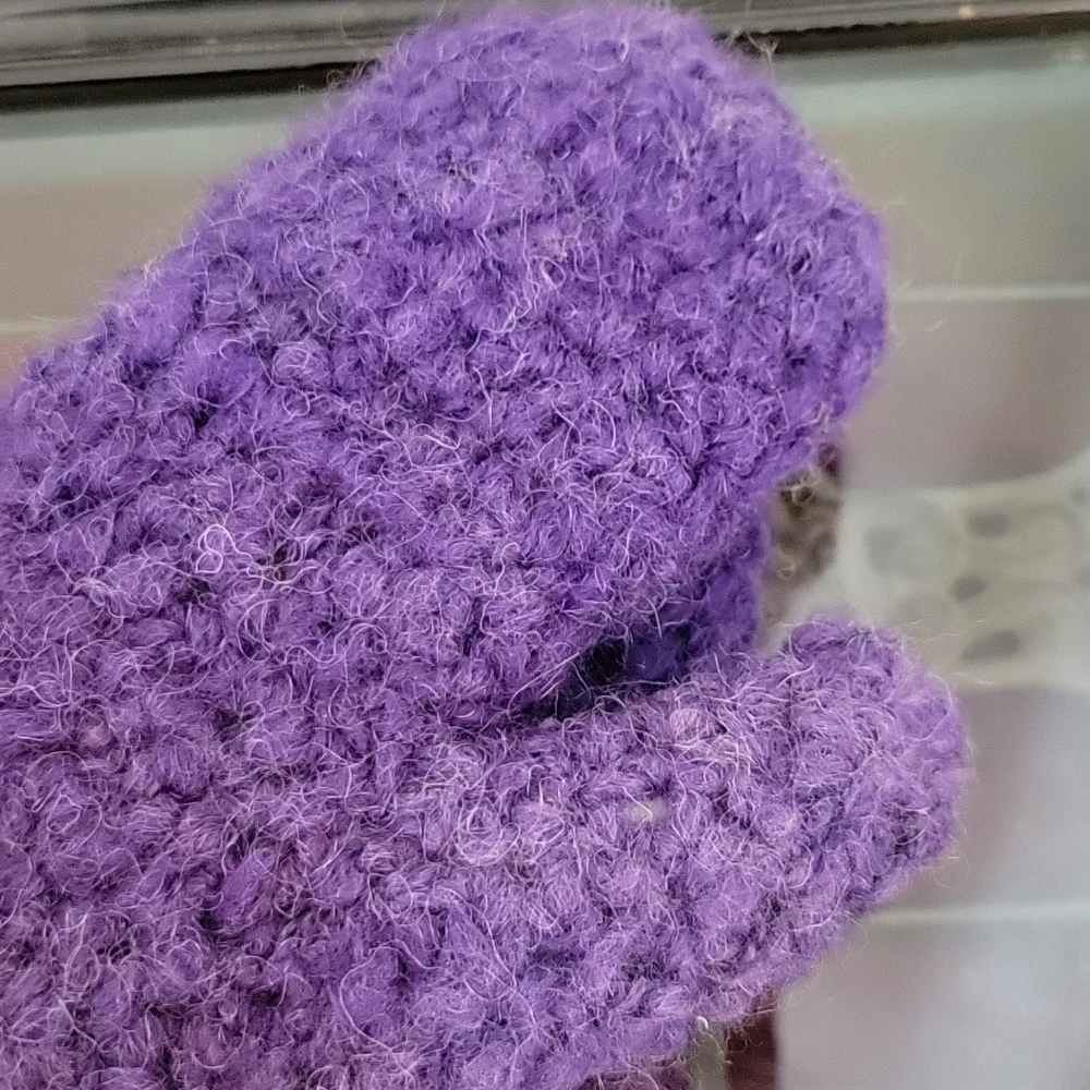 Ladies fuzzy Acrylic crocheted varigated purple mittens with cream fleece lining